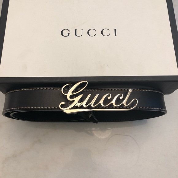 gucci cursive logo